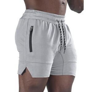 กางเกงขาสั้นจ็อกเกอร์ผู้ชาย โพลีเอสเตอร์ 100% สกรีนโลโก้ได้ กางเกงกีฬา สตรีทแวร์ ระบายอากาศ น้ำหนักเบา เหมาะสำหรับวิ่งและใส่ลำลอง - Product Image 1