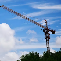 Grue à tour à plateforme plate d'occasion haute performance 6515-10, 10 tonnes, flèche de 42 m, grue de construction robuste prête à l'exportation