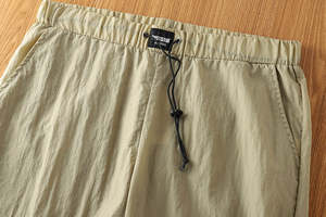 Pantalones cortos ajustados informales de verano de tela suave de poliéster de punto con cintura elástica transpirable para hombre OEM - Product Image 2