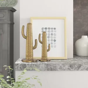 Lot de 2 sculptures d'art rondes en noir et or vintage modernes Objet décoratif en laiton pour la maison ou le bureau Vente en gros - Product Image 4