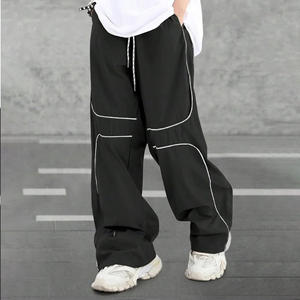 Pantalon coupe-vent avec logo personnalisé Pantalon léger et imperméable avec options de broderie ou d'impression pour le sport et l'extérieur - Product Image 5