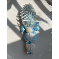 Brosse à cheveux vietnamienne en coquillages marins avec de vrais coquillages marins et un élégant nœud pour cadeau et soins personnels