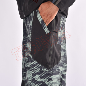 Pantalones de esquí y snowboard holgados para hombre, personalizados al por mayor, con estampado, impermeables, transpirables, con bolsillos con cremallera, resistentes al viento, 100% poliéster - Product Image 5