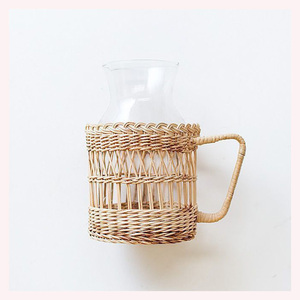 Heirloom-Inspired Bohemian Jug Display Crafted from Natural Rattan and Seagrass Adorned with Detailed Animal Motifs - Product Image 3