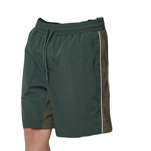 Venta al por mayor de pantalones cortos de playa impermeables elásticos traje de baño para hombre pantalones cortos de tabla verano surf transpirable bolsillos con cordón - Product Image 6