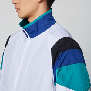 ชุดวอร์มวิ่งผู้ชายผ้าไนลอนกันลม ขายส่งจากโรงงานโดยตรง รับผลิตแบบ OEM ODM ชุดแทรคสูทสีตัดกัน ราคาถูก - Product Image 5