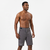 Shorts de cyclisme unisexes pour adultes, séchage rapide, grande taille, avec logo sur la jambe gauche, coupe classique, gris, longueur courte, polyester