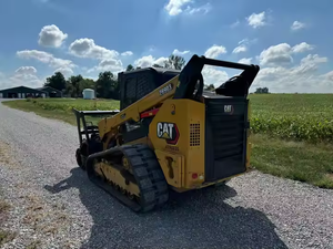 Caterpillar 289D3 d'occasion 2022 avec 2022 Cat HM215 Tête de paillis Cat Skid Steer Loader - Product Image 5