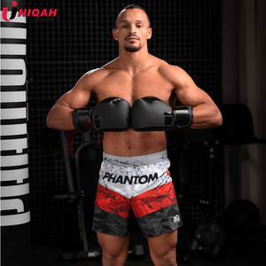 Gants de boxe en cuir de vachette évacuant l'humidité avec logo personnalisé en gros équipement d'entraînement pour le kickboxing Arts martiaux UNIQAH - Product Image 5