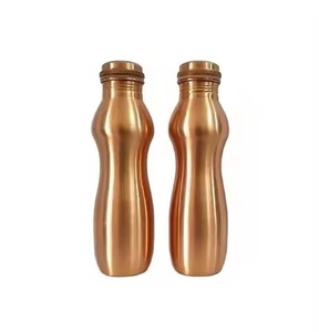 Radiant Smooth Copper <b>Bottle</b> Set With Modern Curved Shape For Wellness Beauty And Graceful Daily Hydration - Product Image 1