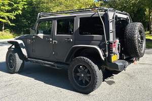 JEEP WRANGLER UNLIMITED SP0RT 4X4 2015 D'OCCASION CÔTÉ GAUCHE/CÔTÉ DROIT - Product Image 4