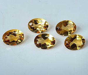 พลอยซิทรีนธรรมชาติทรงวงรีทรงตัดขนาด9X11มม. ทรงวงรีสีเหลืองมะนาวหลวมคุณภาพสูง - Product Image 1