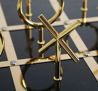 Base en marbre noir de qualité supérieure Tic tac Toe Game Sculpture pour la décoration intérieure et la décoration de table Utilisez un design abstrait avec plaqué or