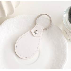 حامل مفاتيح جلدي بيضاوي الشكل مخصص لعام 2025، سلسلة مفاتيح جلدية بيضاوية - Product Image 2