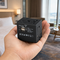 Adaptor Perjalanan Universal Tipe Colokan UK US AUS EU dengan Output USB Pintar 5V 2.4A, Casing Berlapis Karet Hitam untuk Perjalanan Bisnis