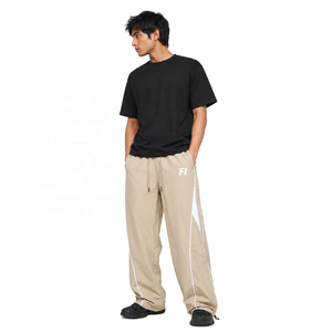 Pantalones anchos personalizados de nailon ligero con cordón, informales, para hombre, con ribete en contraste, para uso exterior, moda, venta al por mayor - Product Image 1