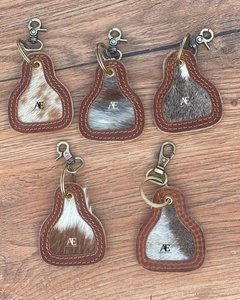 Nouveau porte-clés en cuir de vachette de conception de vente chaude porte-clés en cuir véritable porte-clés élégants porte-clés de haute qualité de forme Unique - Product Image 1