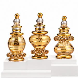 Mini flacons de parfum de luxe vintage en verre ambré soufflé à la main avec garniture dorée – Collection de flacons décoratifs pour cadeaux - Product Image 1