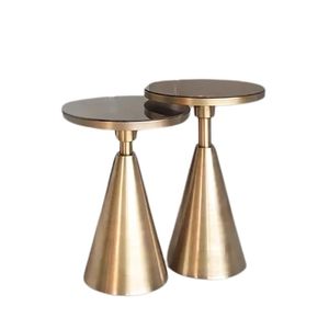 Mesa de diseño antigua de latón con tablero redondo, perfecta para decoración de interiores de lujo en boutiques y salas de exposición. - Product Image 1