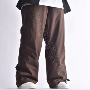 Pantalones de Nieve Impermeables Marrones Unisex Más Vendidos con Forro Cálido y Suave, Cintura con Cordón, Ventilaciones y Bolsillos con Cremallera - Product Image 2