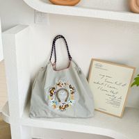 Qetesh sac fourre-tout personnalisation haute qualité grande capacité à la mode étanche Nylon cheval broderie Shopping sac de voyage