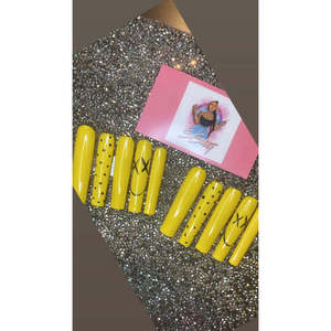 Unghie artificiali gialle con design a sorriso - Product Image 1