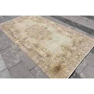 Grand tapis turc de 5x9,3 pieds, tapis persan vintage brun - Product Image 1
