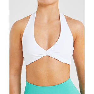 Sujetador deportivo de cuello Halter blanco personalizado con escote en V, detalle de espalda abierta y Sujetador deportivo de alto impacto para mujeres adultas - Product Image 1