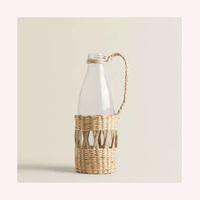 Support de carafe en rotin luxueux fait main, détails bohèmes inspirés des animaux, style côtier, couleur personnalisable pour baptême et anniversaire