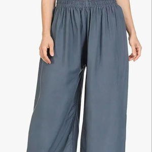 Palazzo d'été décontracté pour femmes avec coupe ample avec taille moyenne élastique respirant et teint uni - Product Image 1