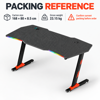 Bureau de jeu avec plateau noir sculpté et repose-pieds orange, surface en panneau E0 de 18 mm, fabriqué en Chine