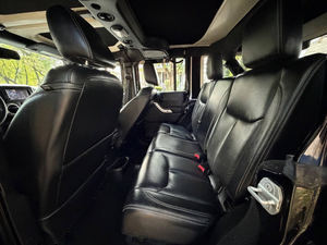 Clean 2014 Jeep Wrangler Unlimited Sahara Dirección Izquierda 4WD - Product Image 5