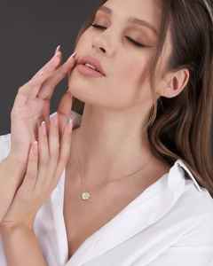 จี้เพชรโมอิสซาไนต์สีขาวทรงกลม เกรด E VS1 ได้รับการรับรองจาก IGI น้ำหนัก 0.25 กะรัต ตัวเรือนเงินสเตอร์ลิงชุบโรเดียม - Product Image 6