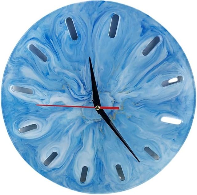Pour the Resin into the Mold: Slowly pour the resin into the mold, filling it to your desired thickness.