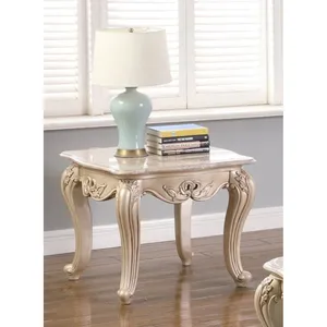 Johnny's square side table is classic mahogany wood with wood carvings and a ivory white wash finish.