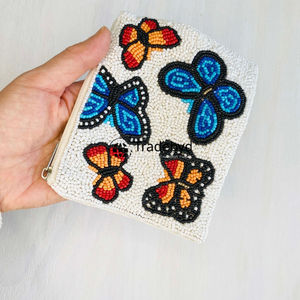 Elegant <b>embroidered</b> <b>clutch</b> with handcrafted patch <b>bag</b> by Tradebyd - Product Image 2