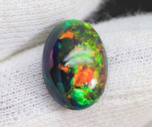 Cabujón de ópalo negro etíope natural, gemas de ópalo de fuego de galaxia Welo, piedra preciosa de ópalo negro etíope bien pulida a precio al por mayor - Product Image 1
