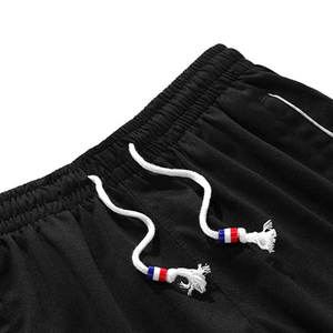 Pantalones cortos de entrenamiento de gimnasio con entrepierna de 7 pulgadas para hombre con bolsillos de patrón sólido informal de tela elástica alta para soporte adicional entrenamiento para correr - Product Image 5