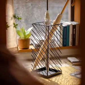 Office and home use metal <b>umbrella</b> <b>stand</b> helps organize <b>umbrellas</b> in <b>indoor</b> settings like hallways or lobbies - Product Image 1