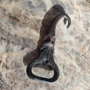 Stylish Antique Cast Iron Bottle Opener With Durable Wall Mount Perfect For Rustic Kitchens Restaurants And Outdoor Spaces - Product Image 1