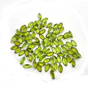 พลอยเพอริดอทดิบสีเขียวธรรมชาติ 100% รูปทรงมาร์คีส์ จำนวน 20 เม็ด ขนาด 5x10 มม. น้ำหนัก 20 กะรัต แบบตาแมว ขายส่ง - Product Image 3