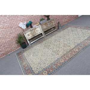 Tapis turc 6,3x9,7 pieds, grand tapis vintage, tapis bleu à motifs de plantes et d'arbres - Product Image 1