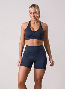 Pantalones cortos ajustados con logotipo personalizado de alta calidad para mujer, pantalones cortos de cintura alta para mujer, pantalones cortos deportivos con cintura compresiva que absorben el sudor - Product Image 5