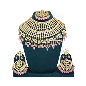 Ensemble de bijoux de mariée lourd en Kundan avec zircon, perles et boucles d'oreilles Maang Tikka pour mariage et fête - Product Image 1