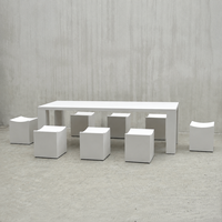 Ensemble de table et chaises de salle à manger blanc au design minimaliste en acier inoxydable pour hôtel, terrasse extérieure, projet de patio d'hôtel de charme