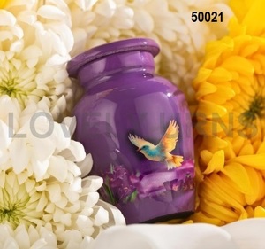 โกศทองเหลืองมนุษย์ขี้เถ้าสลักรูปนกสีม่วง - Product Image 1