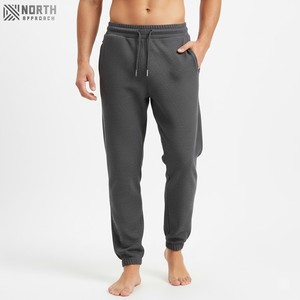 Joggers personalizados de peso pesado grueso 100 algodón mujeres Waffle Knit pantalones de chándal holgados Track Stacked pantalones de chándal Jogger pantalones para hombres - Product Image 1