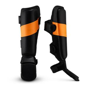 Protège-tibia en cuir personnalisé Oem MMA pour unisexe Design unique Protège-tibia noir pour la boxe - Product Image 1
