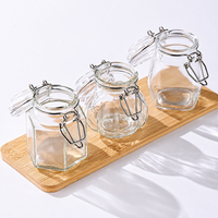 Bocaux en verre ronds à couvercle basculant de qualité alimentaire 50 ml 100 ml avec couvercle à clip pour le stockage du sucre, des bonbons et des épices