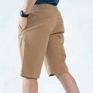 Pantalones cortos casuales de algodón 100% de alta calidad con bolsillos, pantalones cortos sueltos de entrenamiento transpirables, logotipo personalizado, servicio OEM disponible al por mayor - Product Image 3